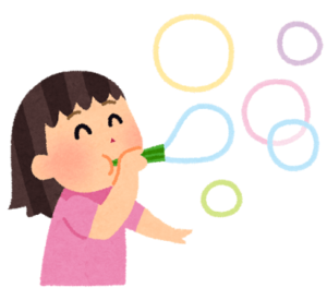シャボン玉を吹いている女の子